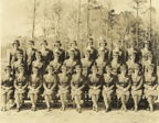 Women Marines basic training class, 1944 - Group photo of a Women Marines basic training class at Camp Lejeune, North Carolina, in early 1944. All of the women wear the Women Marines winter service uniform and winter service hat. Marian Gold Krugman Papers Collection (WV0354.6.002), Betty H. Carter Women Veterans Historical Project, University of North Carolina at Greensboro, NC