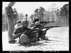 Firing from a seated position, March 1943.