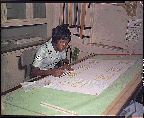 Camp Lejeune, North Carolina. Lance Corporal Norma J. Buffin works as an illustrator at Camp Lejeune's training aids library (1969)